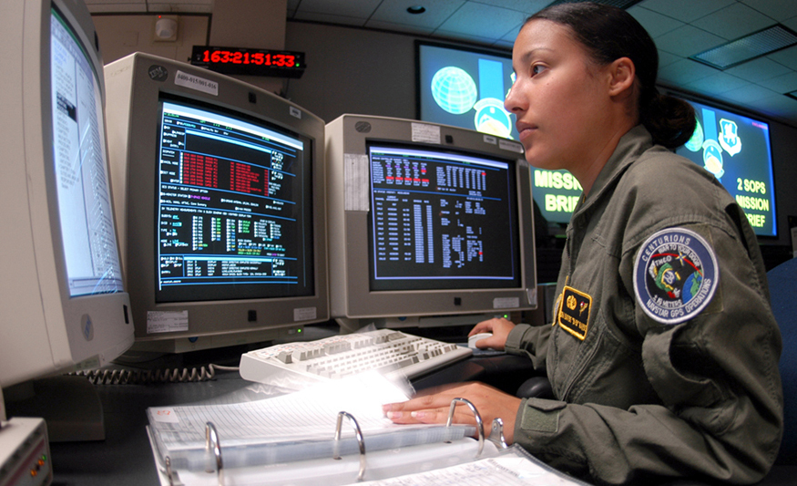 Electric circuits in a computer allow large amounts of data to be quickly and accurately analyzed. (credit: Airman 1st Class Mike Meares, United States Air Force) Photograph of a space systems operator using several computer monitors showing various data.